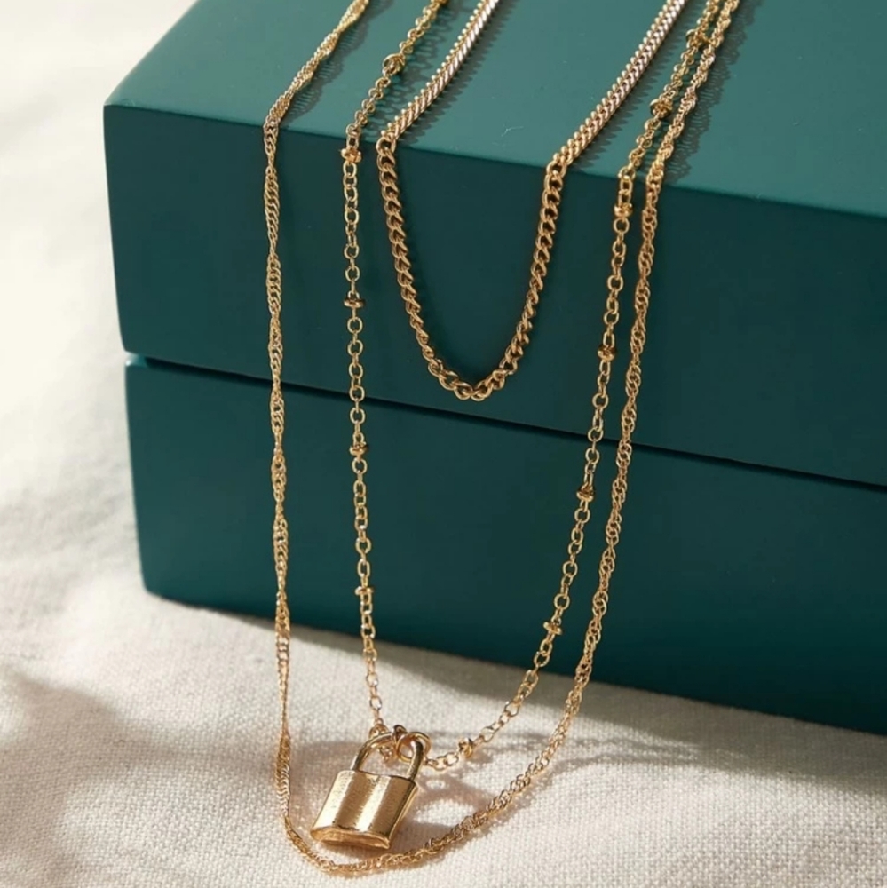 GOLD LOCK CHARM LAYERED NECKLACE